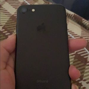 iPhone 7 with charger